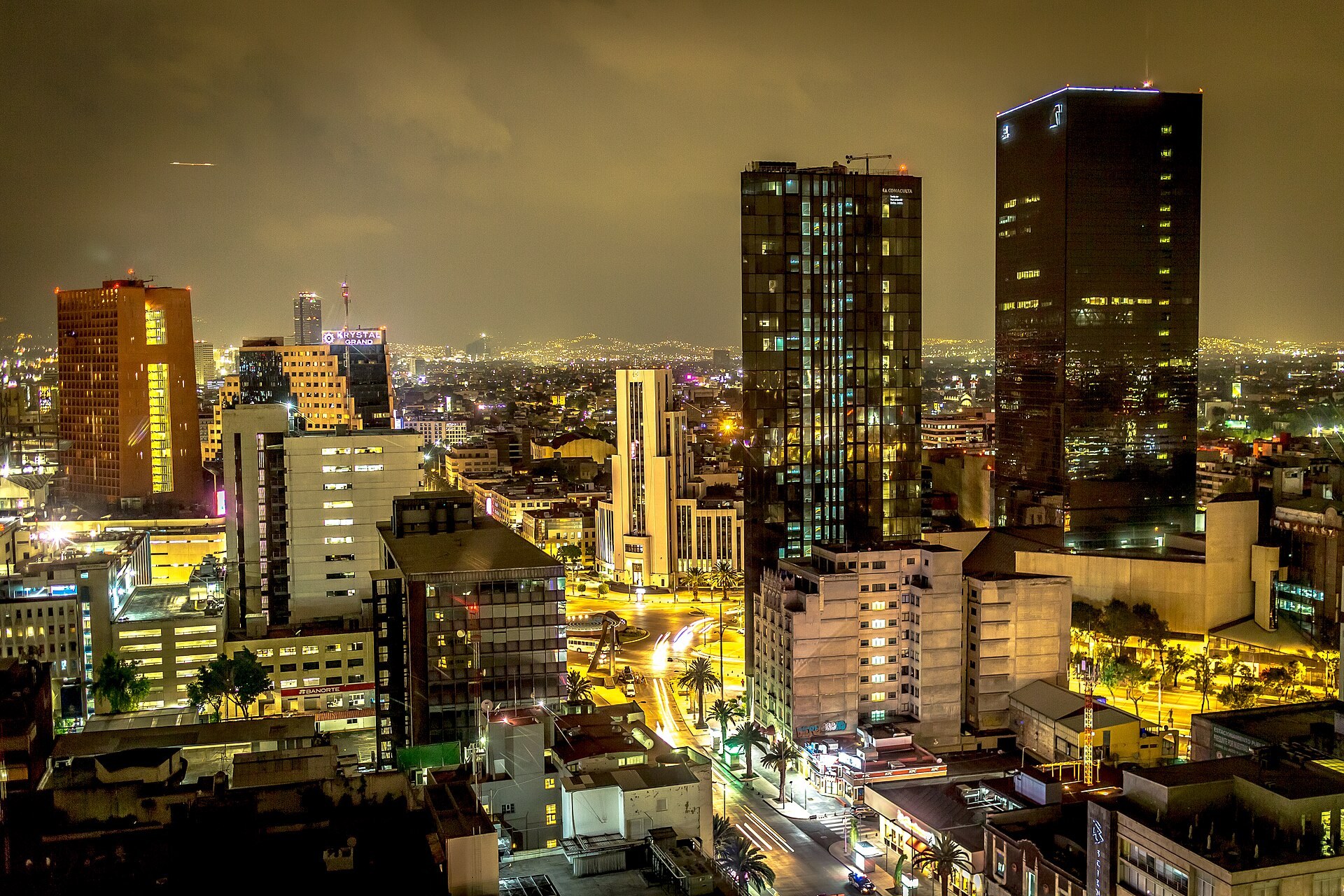 Mexico City night skyline along Paseo de la Reforma